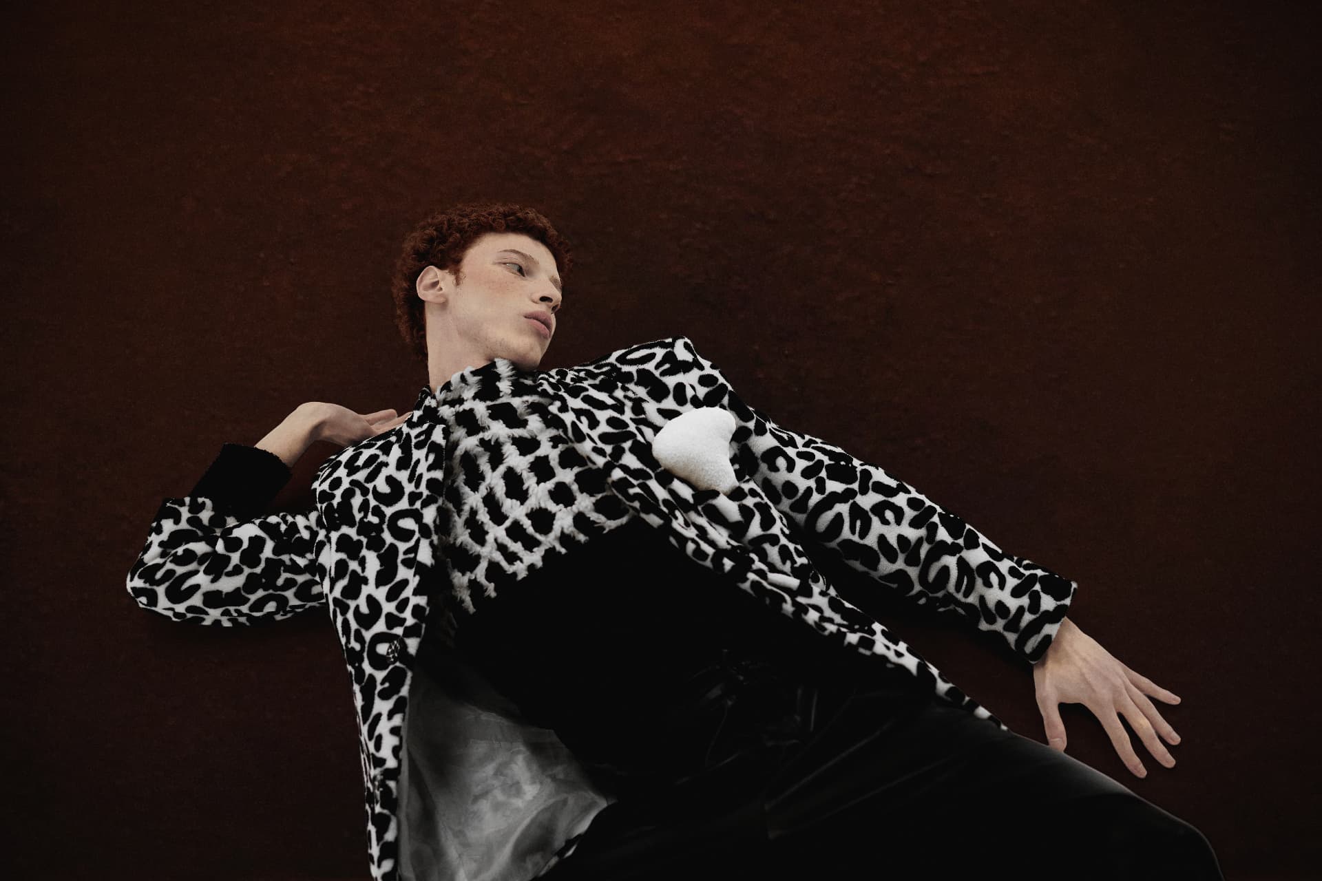 Fashion portrait on dark red